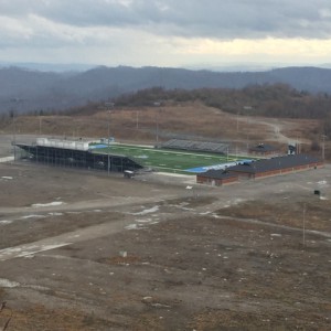 A high school football field in Mingo County, WV, also built on a mountaintop after strip mining. Photo by Khaliungoo Ganbat