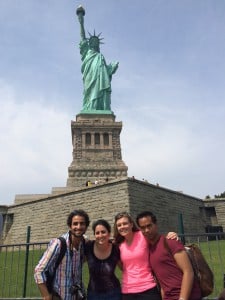 Fulbrigh Student from Yemen, Ammar Mohammed, left, with other Millennial Train Project participants at the Statue of Liberty in New York City, at the conclusion of their journey. August 2014.