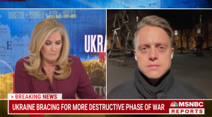 Split screen. Woman conducting live interview on left side, man being interviewed on right side. MSNBC Reports Logo. Chyron reads: Ukraine bracing for more destructive phase of war.